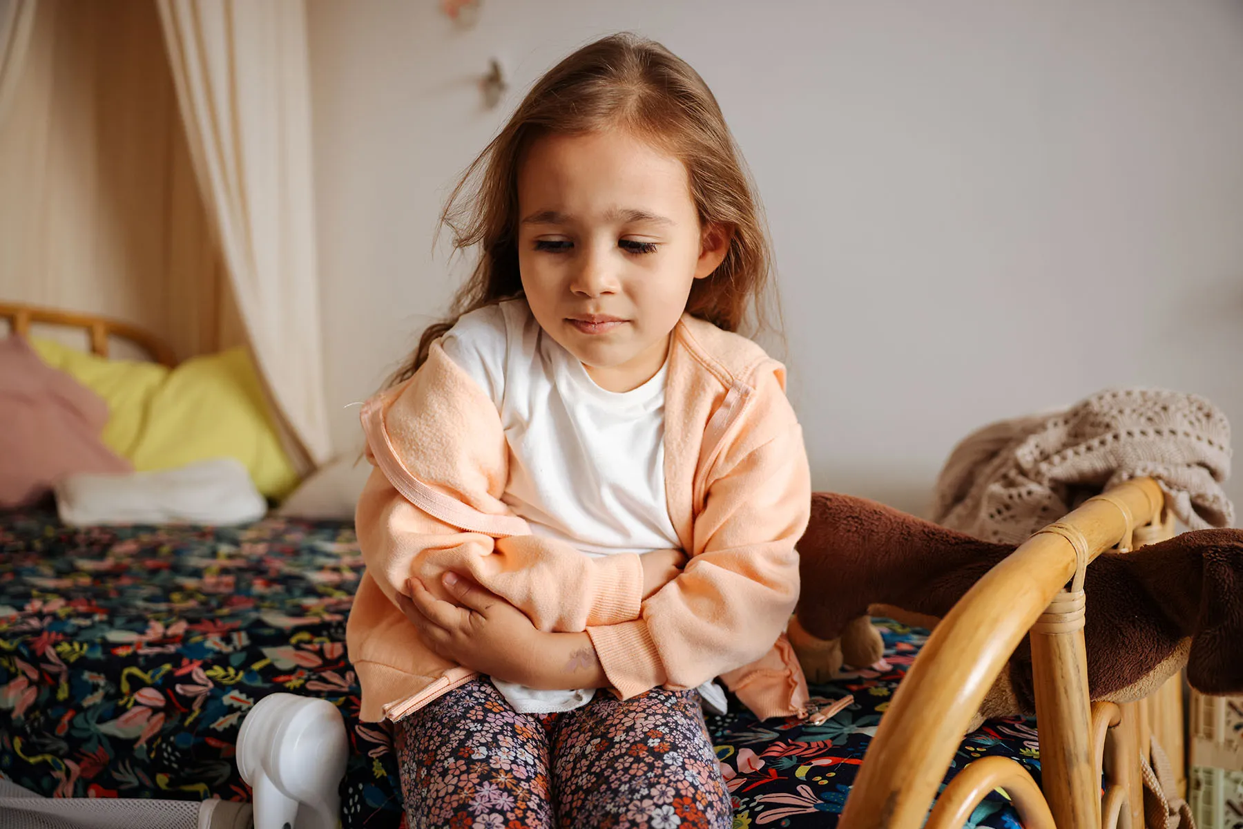 photo of sick child on bed